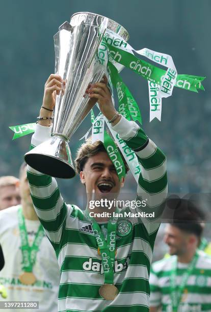 Jota of Celtic is seen with the Cinch Scottish Premiership Trophy during the Cinch Scottish Premiership match between Celtic and Motherwell at Celtic...