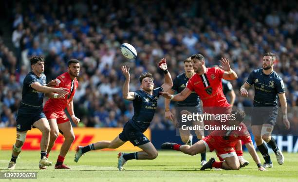 Hugo Keenan of Leinster attempts to control a ball in the air during the Heineken Champions Cup Semi Final match between Leinster Rugby and Stade...