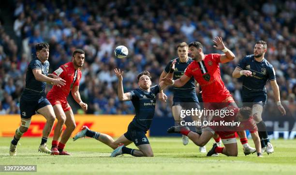 Hugo Keenan of Leinster attempts to control a ball in the air during the Heineken Champions Cup Semi Final match between Leinster Rugby and Stade...