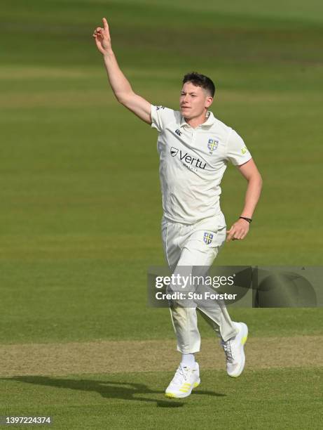 Durham bowler Matthew Potts celebrates after taking the wicket of Andy Gorvin during the LV= Insurance County Championship match between Durham and...