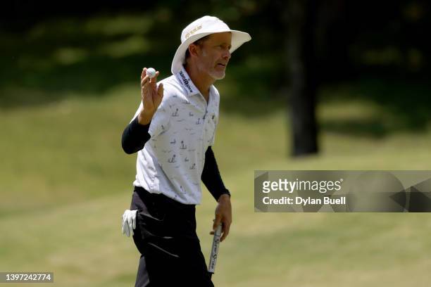 Stuart Appleby of Australia reacts after making par on the fifth green during the third round of the Regions Tradition at Greystone Golf and Country...