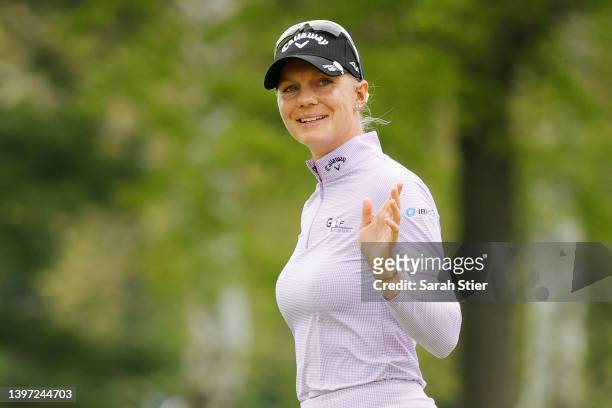 Madelene Sagstrom of Sweden reacts after sinking a putt on the 1st green during the third round of the Cognizant Founders Cup at Upper Montclair...