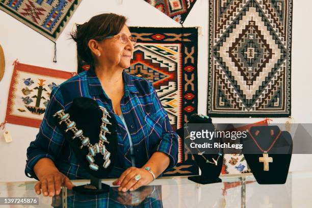 small business owner in a shop - north american tribal culture stock pictures, royalty-free photos & images