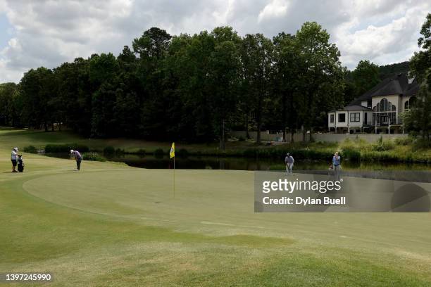 David Branshaw putts on the second green during the third round of the Regions Tradition at Greystone Golf and Country Club on May 14, 2022 in...