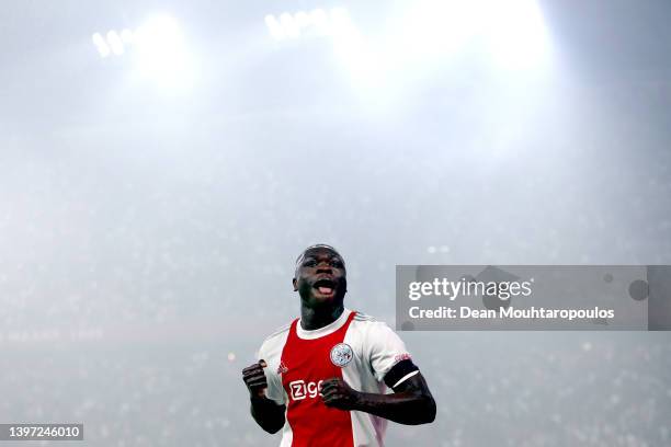 Brian Brobbey of Ajax celebrates after scoring their side's fourth goal during the Dutch Eredivisie match between Ajax and sc Heerenveen at Johan...