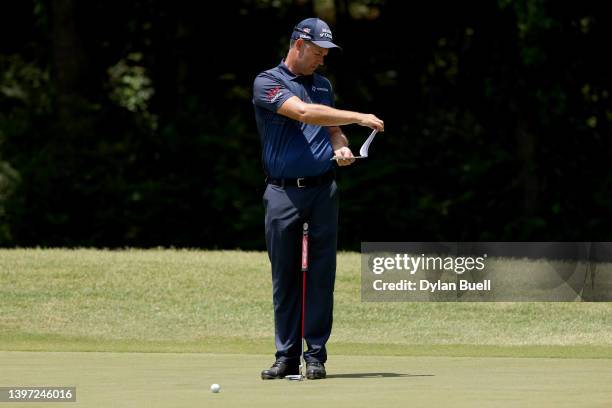 Padraig Harrington of Ireland lines up a putt on the fifth green during the third round of the Regions Tradition at Greystone Golf and Country Club...