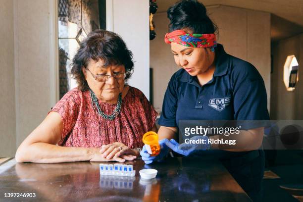senior healthcare assistance in a home - daily life in india imagens e fotografias de stock
