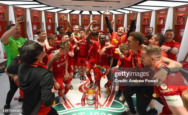Liverpool celebrate winning the Emirates FA Cup in the dressing room at the end of The FA Cup Final match between Chelsea and Liverpool at Wembley...