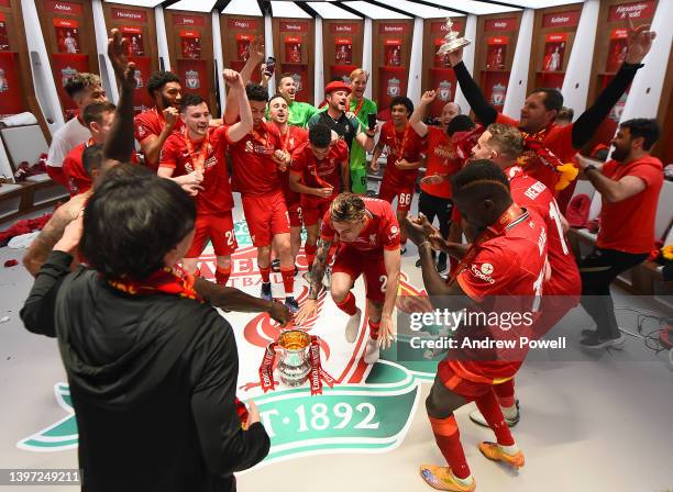 Liverpool celebrate winning the Emirates FA Cup in the dressing room at the end of The FA Cup Final match between Chelsea and Liverpool at Wembley...