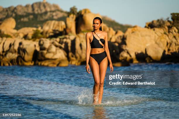 Model poses backstage prior to the Etam Cruise 2022 show at Domaine de Murtoli on May 12, 2022 in Corsica, France.