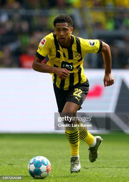 Jude Bellingham of Dortmund runs with the ball during the Bundesliga match between Borussia Dortmund and Hertha BSC at Signal Iduna Park on May 14,...