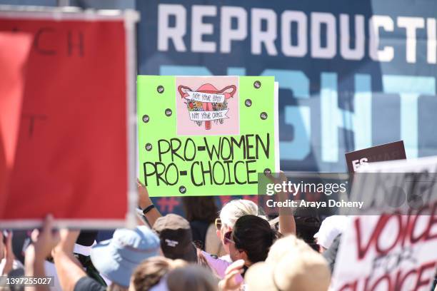 Abortion rights activists hold protest signs during the Women's March Foundation's National Day of Action! The "Bans Off Our Bodies" Reproductive...