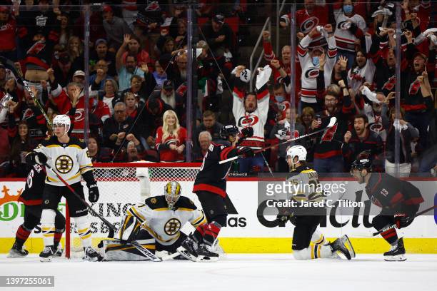 Teuvo Teravainen of the Carolina Hurricanes celebrates with his team after scoring a first period goal in Game Seven of the First Round of the 2022...