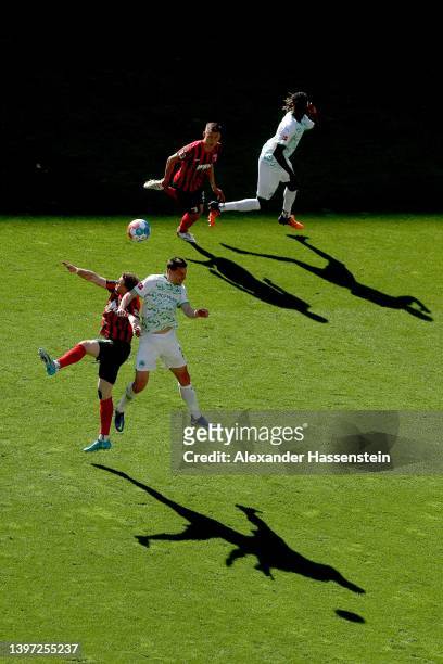 Andre Hahn of Augsburg battles for the ball with during the Bundesliga match between FC Augsburg and SpVgg Nick Viergever of Greuther Fürth at...