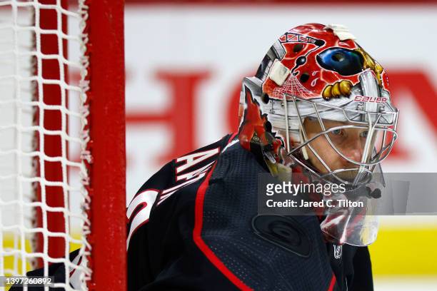 Antti Raanta of the Carolina Hurricanes looks on during the second period in Game Seven of the First Round of the 2022 Stanley Cup Playoffs against...