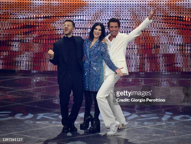 Presenters Alessandro Cattelan, Laura Pausini and Mika are seen on stage during the Grand Final show of the 66th Eurovision Song Contest at Pala...