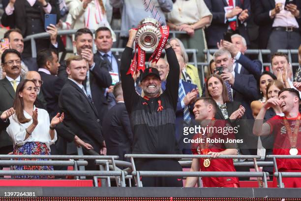 Head Coach Jurgen Klopp of Liverpool lifts the FA Cup after his sides 6-5 penalty shoot-out win after a 0-0 draw during The FA Cup Final match...