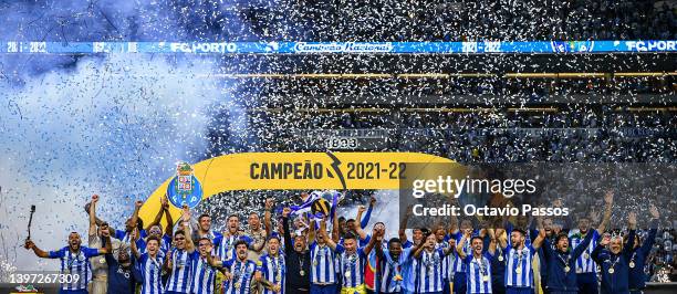 Porto players and coaching staff celebrate winning the title following the Liga Portugal Bwin match between FC Porto and GD Estoril Praia at Estadio...