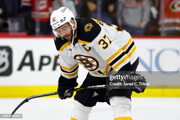 Patrice Bergeron of the Boston Bruins reacts following their 2-3 loss to the Carolina Hurricanes in Game Seven of the First Round of the 2022 Stanley...