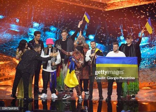 Alessandro Cattelan, Laura Pausini and Mika with Kalush Orchestra of Ukraine as they are named the winners during the Grand Final show of the 66th...