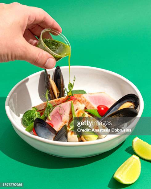 healthy salad with seafood - microgreen stock pictures, royalty-free photos & images