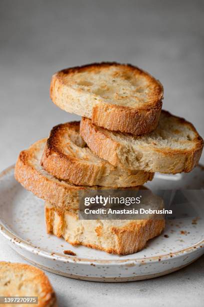 french baguette slices. bread toasts. - appetizer stock pictures, royalty-free photos & images
