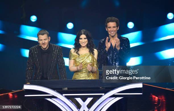 Alessandro Cattelan, Laura Pausini and Mika are seen on stage during the Grand Final show of the 66th Eurovision Song Contest at Pala Alpitour on May...
