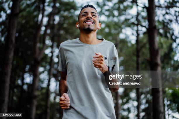 portrait of a man with vitiligo exercising outdoors - systemic lupus erythematosus stock pictures, royalty-free photos & images