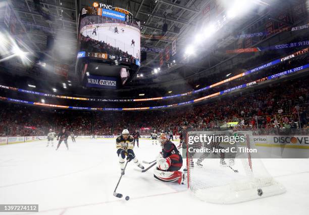 Antti Raanta of the Carolina Hurricanes makes a save first period saveagainst David Pastrnak of the Boston Bruins in Game Seven of the First Round of...