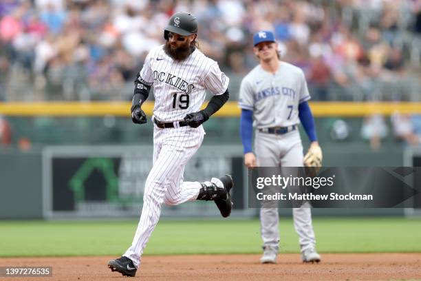 Charlie Blackmon of the Colorado Rockies circle the bases after hitting a two RBI home run against the Kansas City Royals in the first inning at...