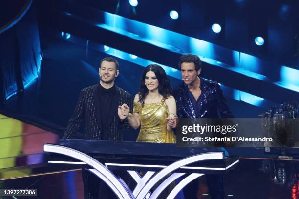 Alessandro Cattelan, Laura Pausini and Mika speak on stage during the Grand Final show of the 66th Eurovision Song Contest at Pala Alpitour on May...