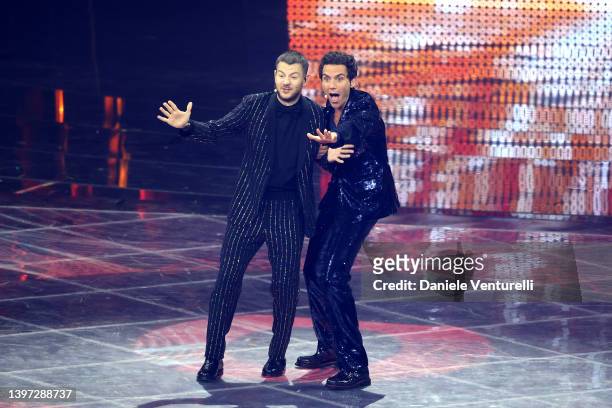 Alessandro Cattelan and Mika speak on stage during the Grand Final show of the 66th Eurovision Song Contest at Pala Alpitour on May 14, 2022 in...