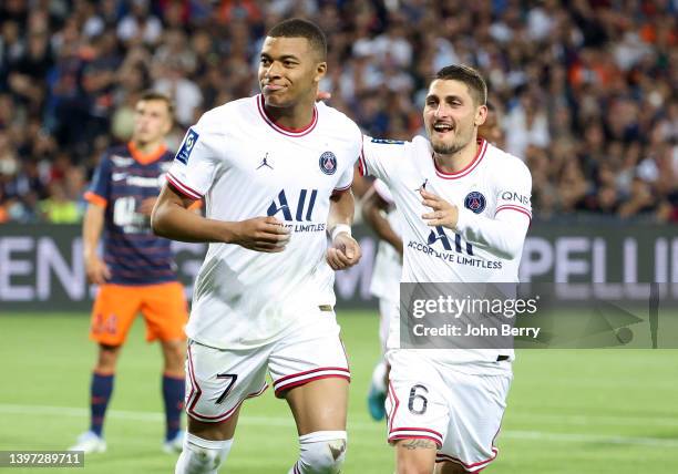 Kylian Mbappe of PSG celebrates his goal with Marco Verratti during the Ligue 1 Uber Eats match between Montpellier HSC and Paris Saint Germain at...