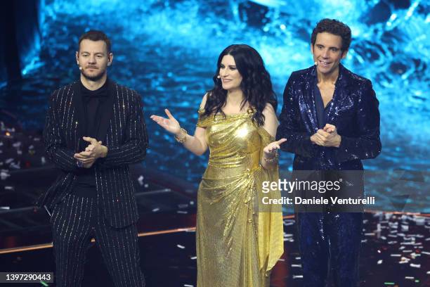 Alessandro Cattelan, Laura Pausini and Mika speak on stage during the Grand Final show of the 66th Eurovision Song Contest at Pala Alpitour on May...