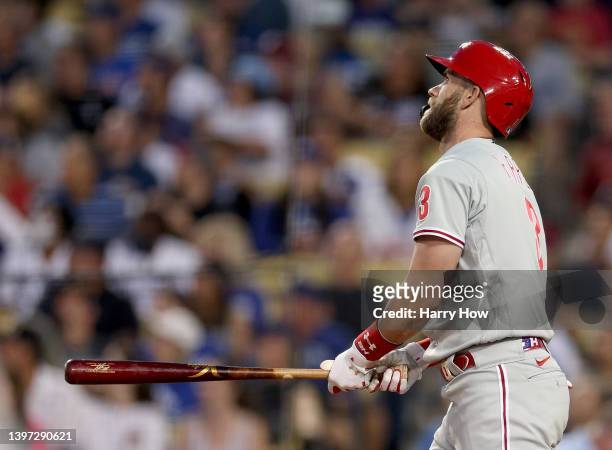 Bryce Harper of the Philadelphia Phillies watches his three run homerun, to take a 6-1 lead over the Los Angeles Dodgers during the third inning at...