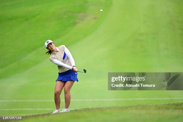 Ayaka Watanabe of Japan chips onto the 15th green during the final round of the Hoken no Madoguchi Ladies at Fukuoka Country Club Wajiro Course on...