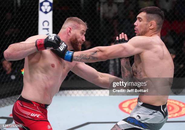 Jan Blachowicz of Poland punches Aleksandar Rakic of Austria in a light heavyweight fight during the UFC Fight Night event at UFC APEX on May 14,...