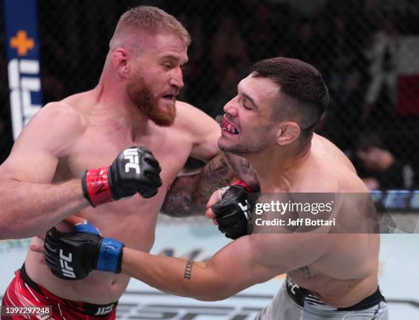 Jan Blachowicz of Poland punches Aleksandar Rakic of Austria in a light heavyweight fight during the UFC Fight Night event at UFC APEX on May 14,...