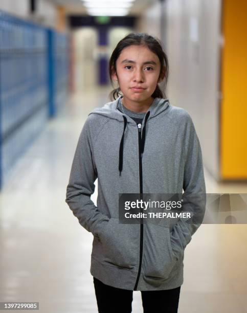 sixteen years old teenage girl school portrait - sad girl standing stock pictures, royalty-free photos & images