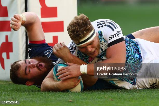 Ollie Norris of the Chiefs dives in to score a try during the round 13 Super Rugby Pacific match between the Melbourne Rebels and the Chiefs at AAMI...