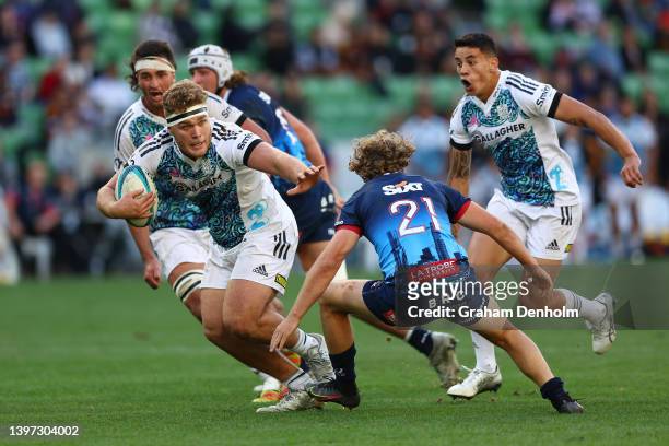 Ollie Norris of the Chiefs runs with the ball during the round 13 Super Rugby Pacific match between the Melbourne Rebels and the Chiefs at AAMI Park...