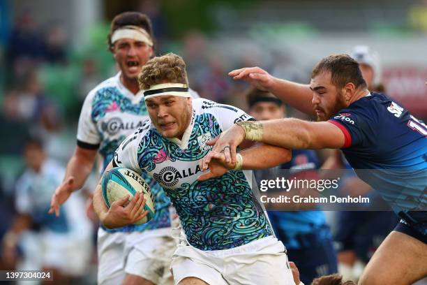 Ollie Norris of the Chiefs runs with the ball during the round 13 Super Rugby Pacific match between the Melbourne Rebels and the Chiefs at AAMI Park...