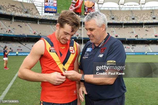 Casey Voss of the SANFL and Mark Williams, assistant coach of the Melborne Demons talk about the Foss-Williams medal following the WAFL v SANFL 2022...