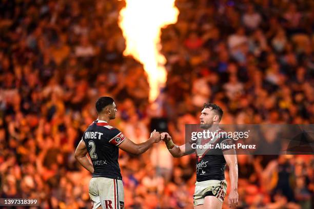 Daniel Tupou and Angus Crichton of the Roosters celebrate their victory at the final siren during the round 10 NRL match between the Sydney Roosters...