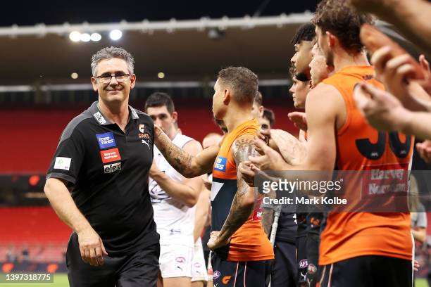 Giants coach Leon Cameron leaves the field through a guard of honour after his last match in the round nine AFL match between the Greater Western...