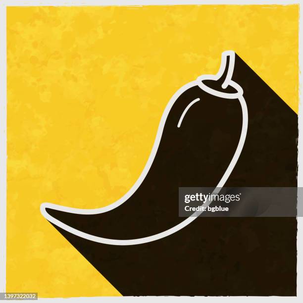 chilli pepper. icon with long shadow on textured yellow background - raw materials vector stock illustrations