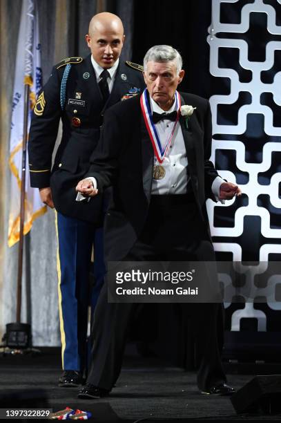 Chi-Chi Rodriguez appears onstage as he is honored at the 35th Anniversary Ellis Island Medals of Honor at Ellis Island on May 14, 2022 in New York...