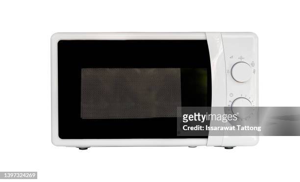 microwave oven isolated on white background. - micro bildbanksfoton och bilder