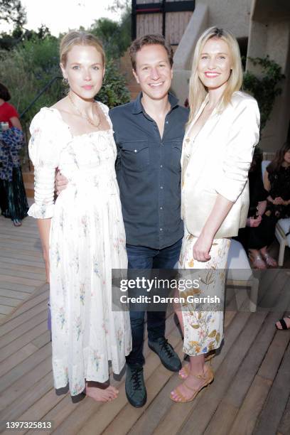 Gabriella Wilde, Dave Clark and Lynn Anderson-Clark attend the Beach Caves launch at Six Senses Ibiza on May 13, 2022 in Ibiza, Spain.