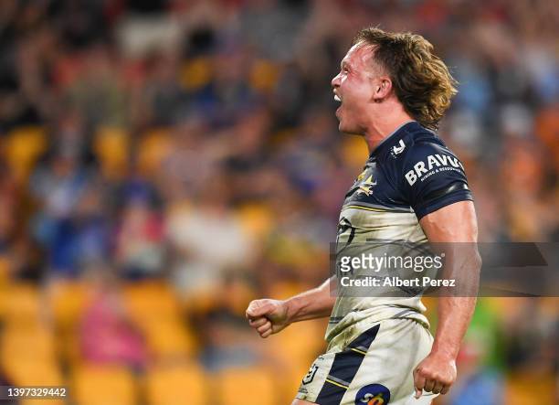 Reuben Cotter of the Cowboys celebrates scoring a try during the round 10 NRL match between the Wests Tigers and the North Queensland Cowboys at...